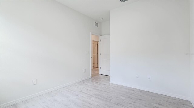 14424 59th Cir E, Bradenton, FL 34211 - empty room with light wood-style flooring and baseboards