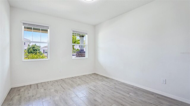 14424 59th Cir E, Bradenton, FL 34211 - empty room with wood finished floors