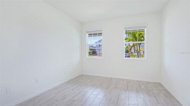 14424 59th Cir E, Bradenton, FL 34211 - spare room with light wood-style floors and baseboards