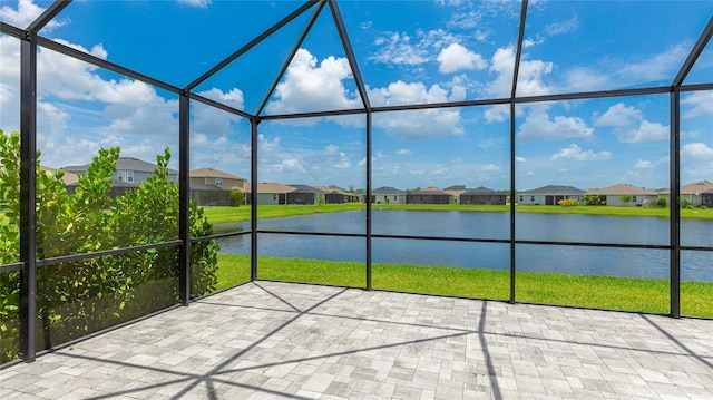 14424 59th Cir E, Bradenton, FL 34211 - unfurnished sunroom featuring a residential view and a water view