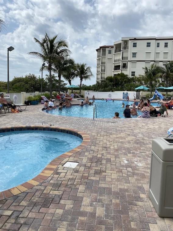 12000 Gulf Blvd Unit 403-S, Treasure Island, FL 33706 - community pool featuring a patio