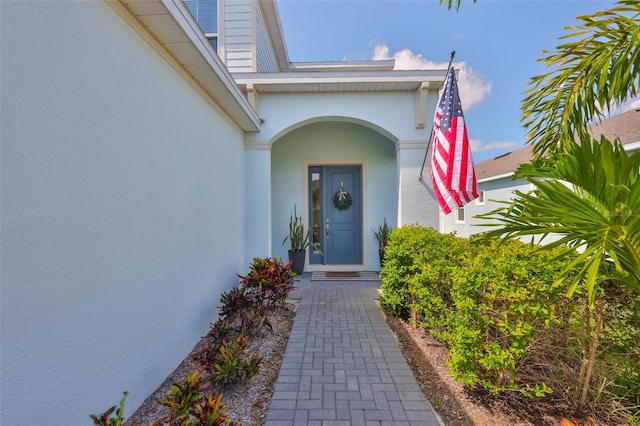 314 Blackrock Ln, Apollo Beach, FL 33572 - doorway to property featuring stucco siding