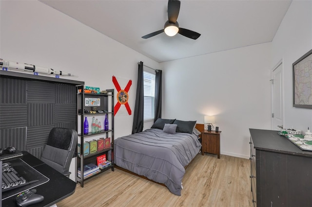 314 Blackrock Ln, Apollo Beach, FL 33572 - bedroom with light wood finished floors, a desk, and a ceiling fan