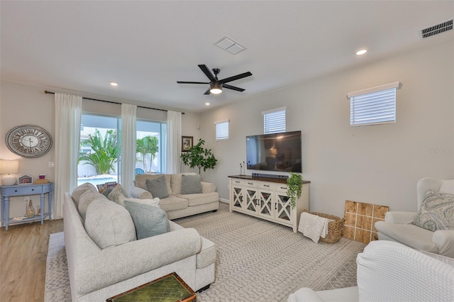 314 Blackrock Ln, Apollo Beach, FL 33572 - living room featuring ceiling fan, wood finished floors, and recessed lighting