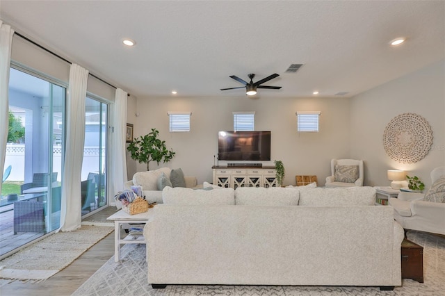 314 Blackrock Ln, Apollo Beach, FL 33572 - living room with a ceiling fan, plenty of natural light, light wood-style flooring, and recessed lighting