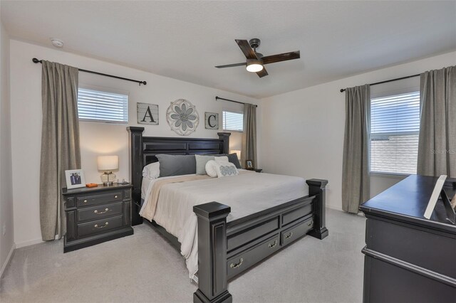 314 Blackrock Ln, Apollo Beach, FL 33572 - bedroom with light colored carpet and ceiling fan