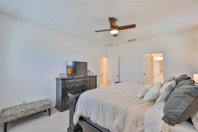314 Blackrock Ln, Apollo Beach, FL 33572 - bedroom with light carpet, ceiling fan, and connected bathroom