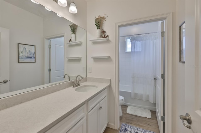 314 Blackrock Ln, Apollo Beach, FL 33572 - full bath with vanity, wood finished floors, and shower / bath combo with shower curtain