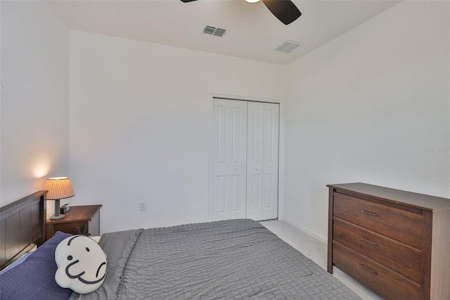 314 Blackrock Ln, Apollo Beach, FL 33572 - bedroom featuring light carpet, a closet, and ceiling fan