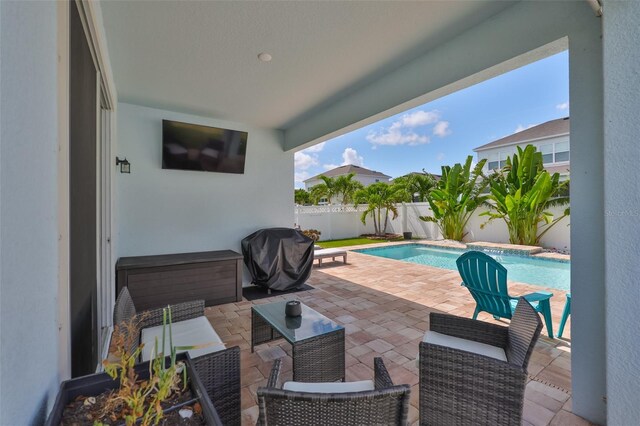 314 Blackrock Ln, Apollo Beach, FL 33572 - view of pool featuring grilling area, a patio, and a fenced backyard