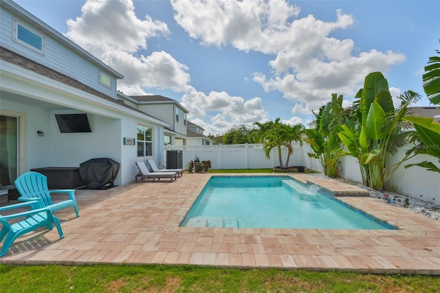 314 Blackrock Ln, Apollo Beach, FL 33572 - view of swimming pool featuring a patio, a fenced backyard, and grilling area