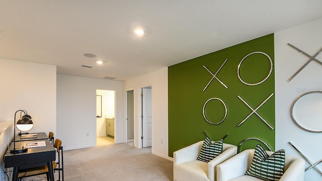12474 Gust Ct, Hudson, FL 34669 - sitting room featuring light carpet and recessed lighting