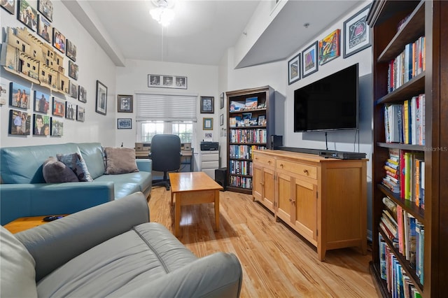 100 4th Ave S Unit 103, Saint Petersburg, FL 33701 - living room featuring light wood finished floors and an office area