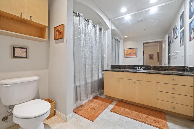 100 4th Ave S Unit 103, Saint Petersburg, FL 33701 - full bath with vanity, shower / tub combo with curtain, tile patterned floors, and recessed lighting
