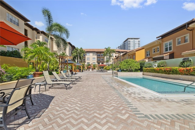 100 4th Ave S Unit 103, Saint Petersburg, FL 33701 - community pool with a patio area