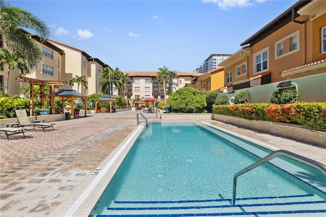 100 4th Ave S Unit 103, Saint Petersburg, FL 33701 - community pool featuring a residential view and a gazebo