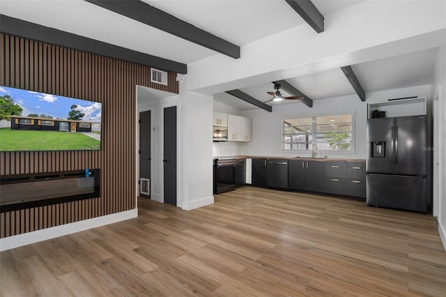 1707 Windsor Way, Tampa, FL 33619 - kitchen with refrigerator with ice dispenser, dishwashing machine, beamed ceiling, light wood-style flooring, and ceiling fan