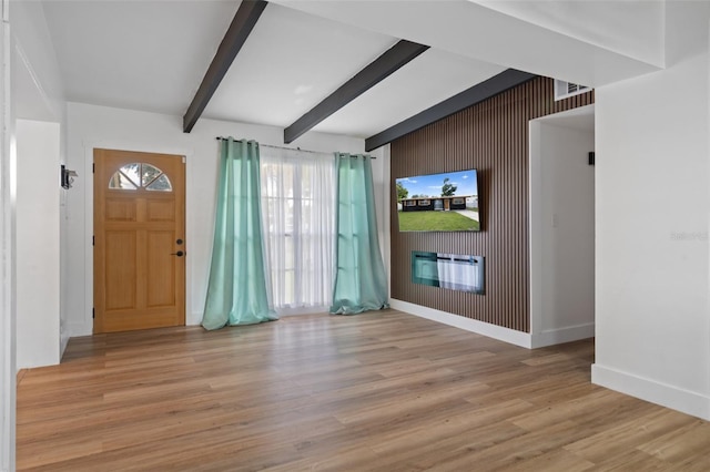 1707 Windsor Way, Tampa, FL 33619 - foyer entrance featuring beam ceiling and wood finished floors