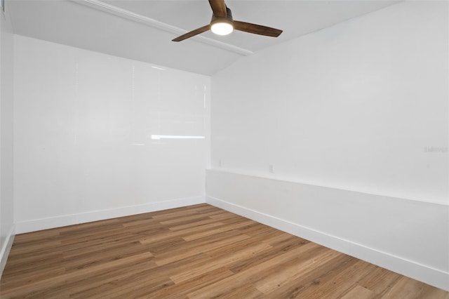 1707 Windsor Way, Tampa, FL 33619 - empty room featuring wood finished floors, a ceiling fan, and lofted ceiling