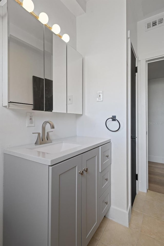 1707 Windsor Way, Tampa, FL 33619 - bathroom featuring tile patterned floors and vanity