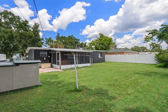 1707 Windsor Way, Tampa, FL 33619 - back of property with a sunroom