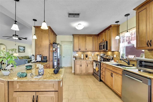 13814 Lavender Ave, Hudson, FL 34667 - kitchen with stainless steel appliances, tasteful backsplash, light tile patterned floors, ceiling fan, and light stone counters