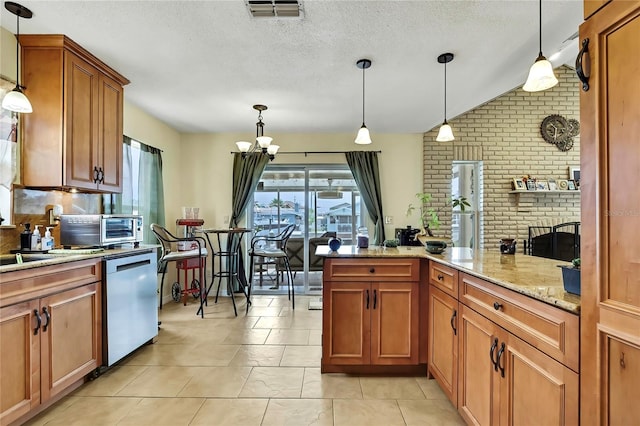 13814 Lavender Ave, Hudson, FL 34667 - kitchen with dishwasher, brown cabinets, hanging light fixtures, light stone countertops, and a chandelier