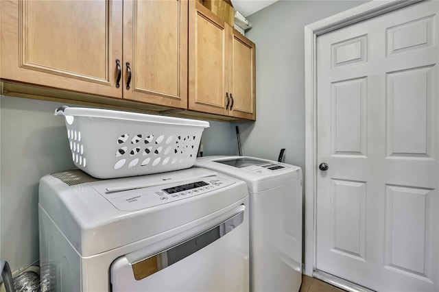 13814 Lavender Ave, Hudson, FL 34667 - laundry area featuring cabinet space and washing machine and clothes dryer