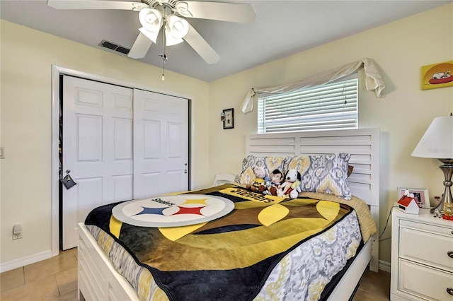 13814 Lavender Ave, Hudson, FL 34667 - bedroom featuring light tile patterned floors, a closet, and ceiling fan