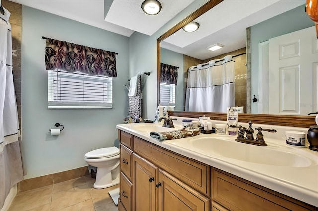 13814 Lavender Ave, Hudson, FL 34667 - bathroom featuring double vanity, tile patterned flooring, and a shower with shower curtain