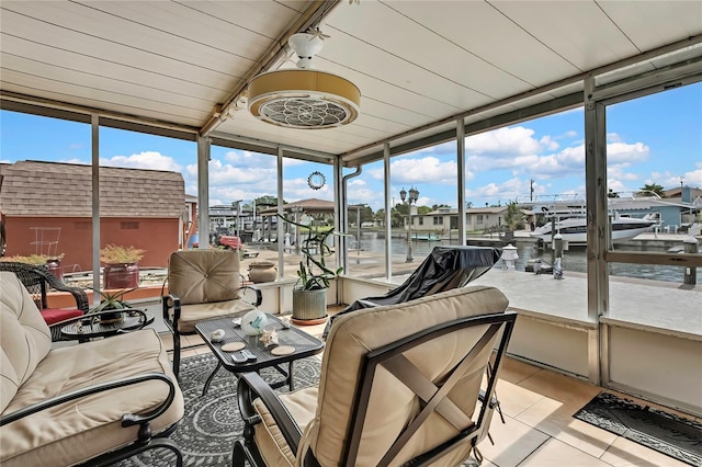13814 Lavender Ave, Hudson, FL 34667 - sunroom with an outdoor hangout area and a water view