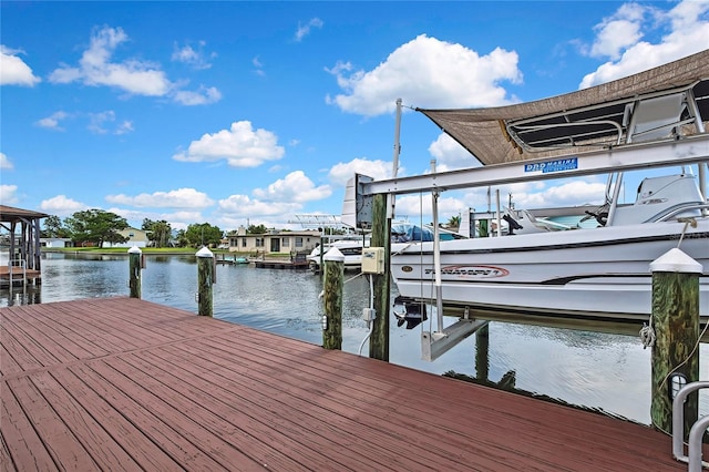 13814 Lavender Ave, Hudson, FL 34667 - dock featuring boat lift and a water view