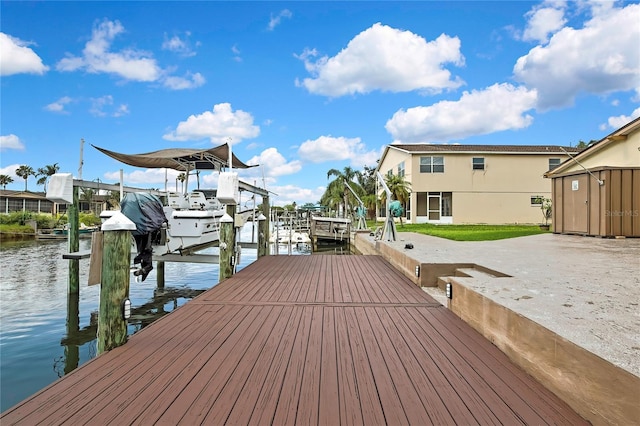 13814 Lavender Ave, Hudson, FL 34667 - dock area featuring boat lift and a water view
