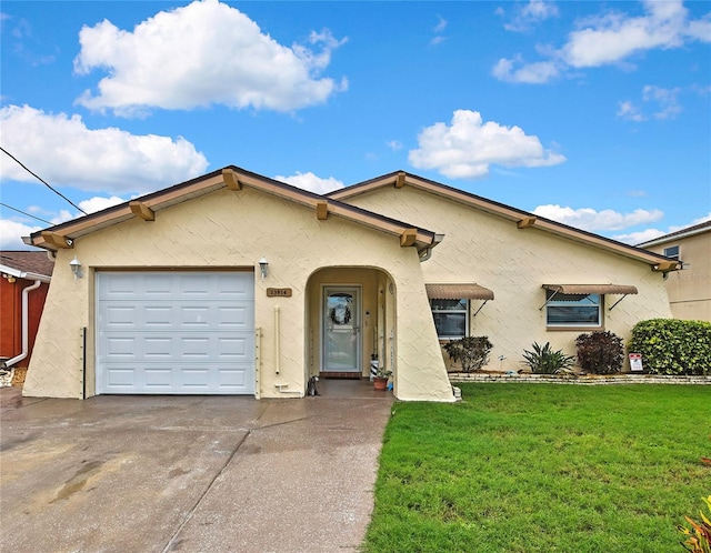 13814 Lavender Ave, Hudson, FL 34667 - view of front facade featuring a front yard, driveway, stucco siding, and an attached garage