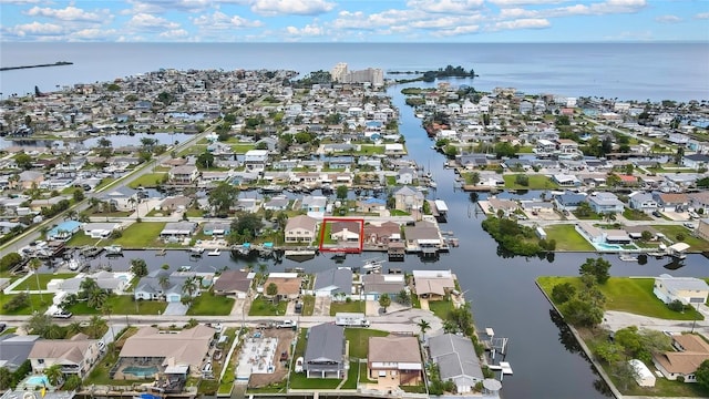 13814 Lavender Ave, Hudson, FL 34667 - aerial view of property's location featuring a large body of water, nearby suburban area, and property parcel outlined
