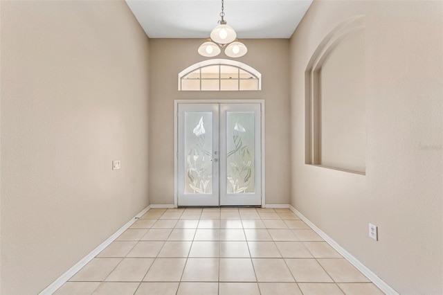 5309 Spectacular Bid Dr, Wesley Chapel, FL 33544 - foyer entrance featuring french doors and light tile patterned floors