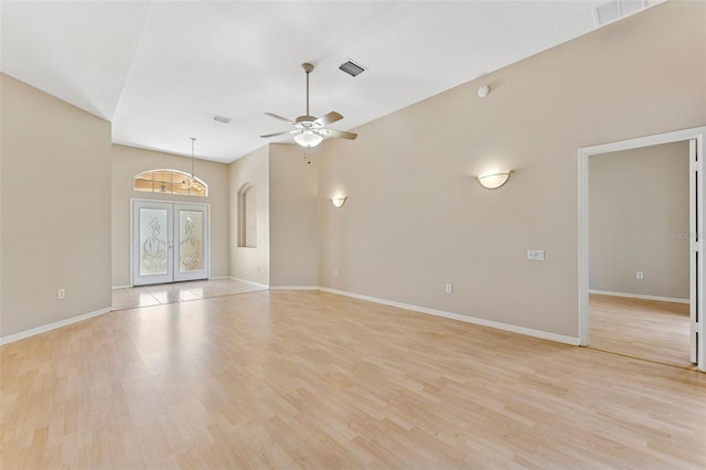 5309 Spectacular Bid Dr, Wesley Chapel, FL 33544 - unfurnished room with light wood-style flooring, ceiling fan, and vaulted ceiling
