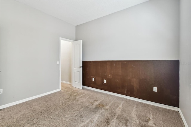 11541 Tangle Branch Ln, Gibsonton, FL 33534 - carpeted spare room featuring baseboards