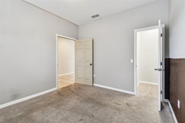 11541 Tangle Branch Ln, Gibsonton, FL 33534 - unfurnished bedroom with carpet and baseboards
