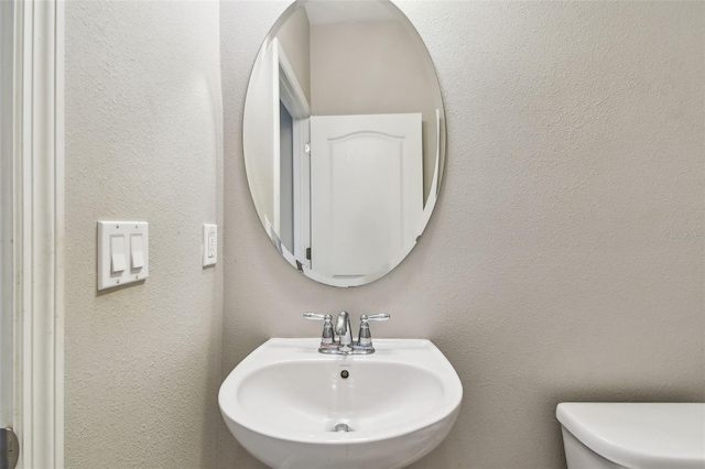 11541 Tangle Branch Ln, Gibsonton, FL 33534 - bathroom with a sink and toilet