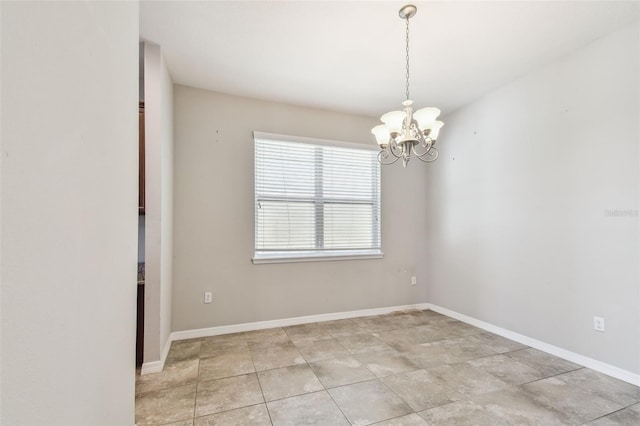 11541 Tangle Branch Ln, Gibsonton, FL 33534 - empty room with a chandelier and baseboards