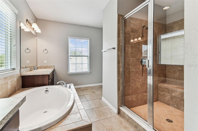 11541 Tangle Branch Ln, Gibsonton, FL 33534 - bathroom featuring vanity, a bath, a stall shower, and tile patterned floors