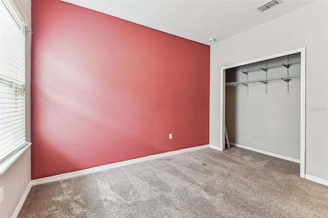 11541 Tangle Branch Ln, Gibsonton, FL 33534 - unfurnished bedroom featuring carpet and a closet