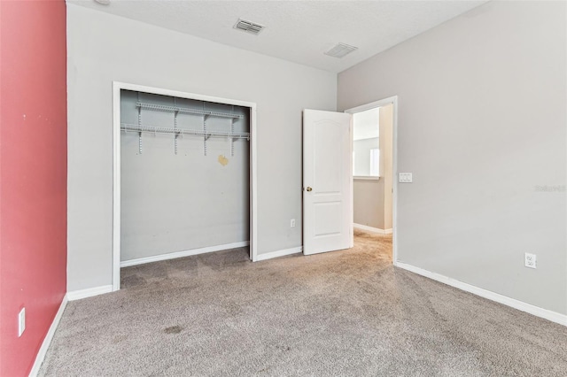 11541 Tangle Branch Ln, Gibsonton, FL 33534 - unfurnished bedroom featuring carpet and a closet