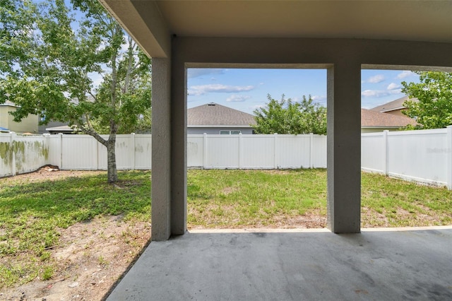 11541 Tangle Branch Ln, Gibsonton, FL 33534 - fenced backyard featuring a patio area