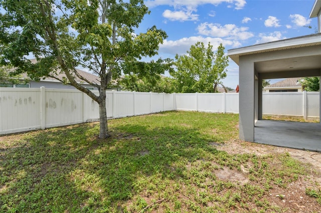 11541 Tangle Branch Ln, Gibsonton, FL 33534 - fenced backyard with a patio