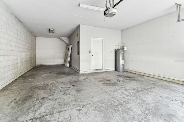 11541 Tangle Branch Ln, Gibsonton, FL 33534 - garage featuring electric water heater, a garage door opener, and concrete block wall