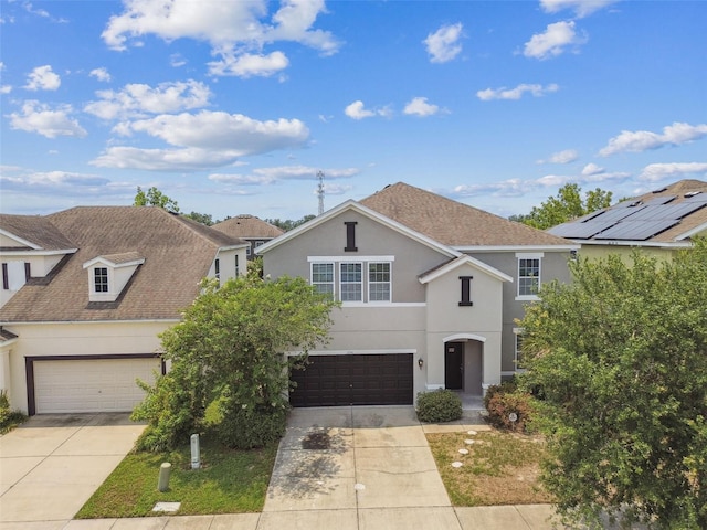 11541 Tangle Branch Ln, Gibsonton, FL 33534 - traditional-style house featuring stucco siding, concrete driveway, and a shingled roof