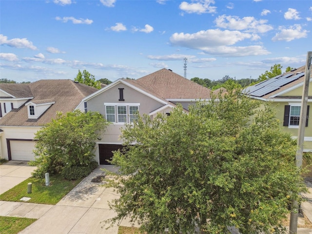 11541 Tangle Branch Ln, Gibsonton, FL 33534 - view of front facade with stucco siding and driveway
