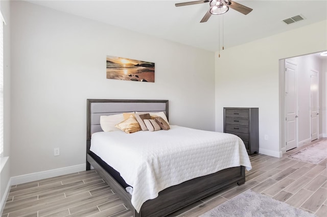2132 Limestone Trl, Kissimmee, FL 34747 - bedroom with wood finish floors and ceiling fan